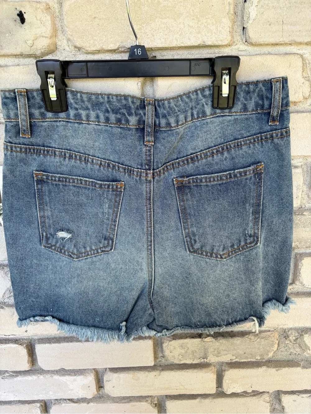 Chelsea & Violet Distressed Blue Denim girls Shorts.  fringe hem